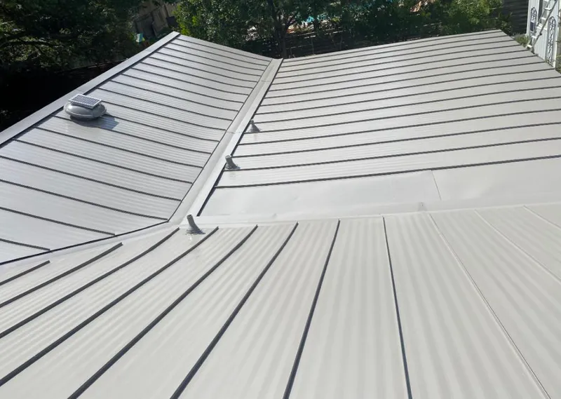 Solar attic fan installed on a metal roof for Roof Ventilation in Gardnerville